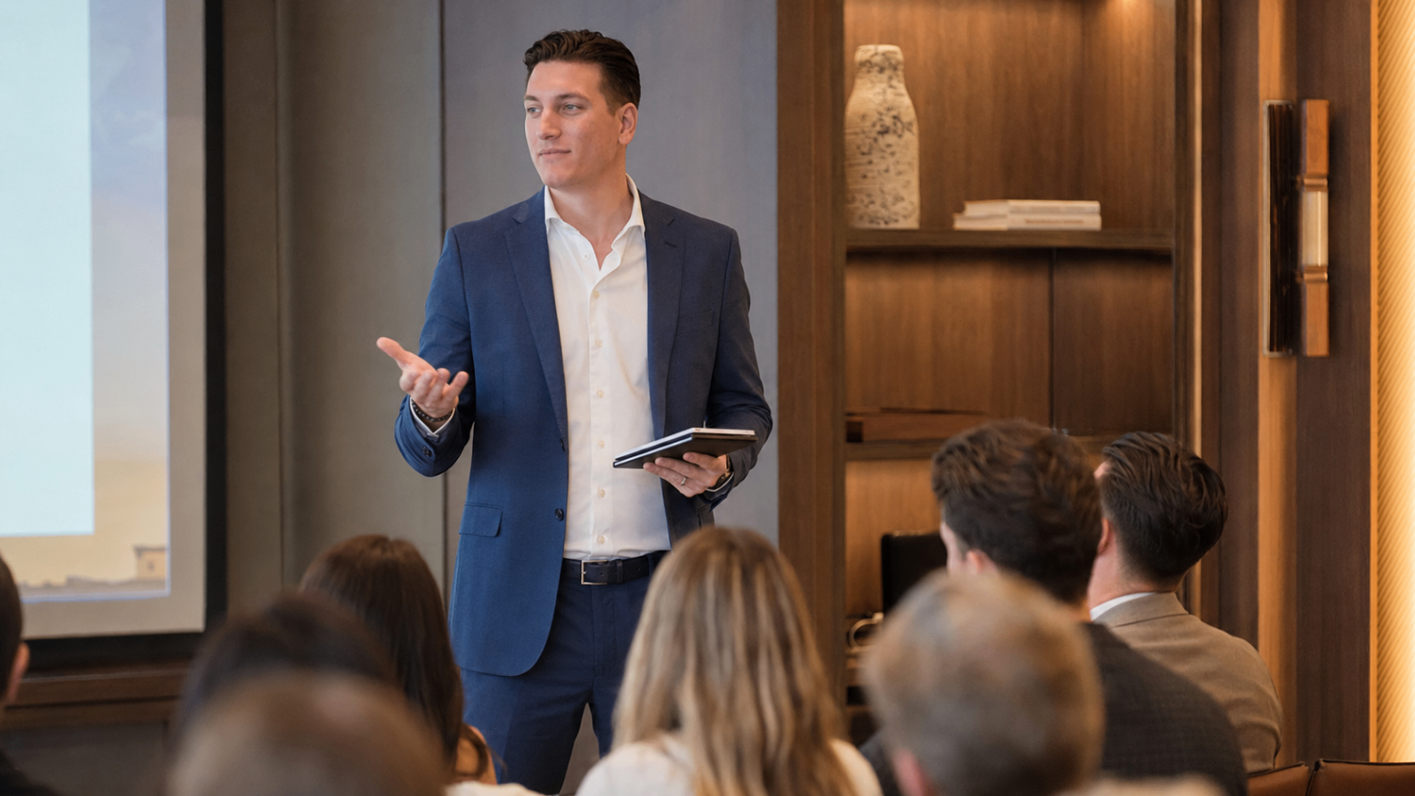 Reuel Lento speaking at a live event